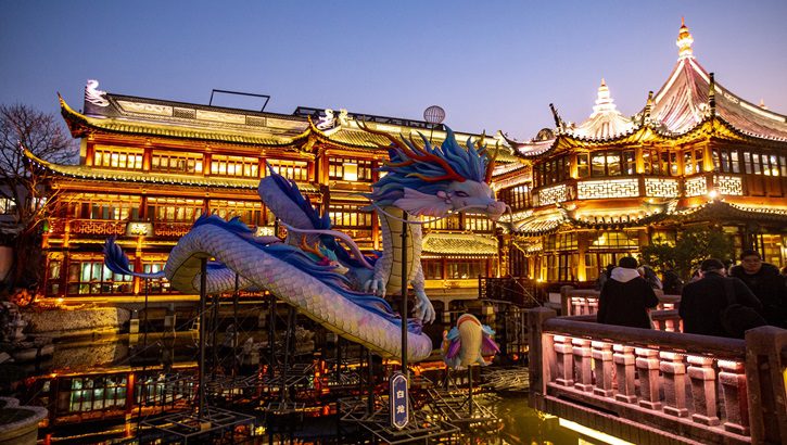 SHANGHAI, CHINA - JANUARY 05: Tourists view a dragon lantern at Yuyuan Garden on January 5, 2024 in Shanghai, China. Shanghai's Yuyuan Garden is decorated with colorful lanterns as a preview for its annual lantern fair, which will officially begin in mid-to-late January 2024 and last for over 40 days to celebrate the Year of the Dragon. (Photo by VCG/VCG via AP )